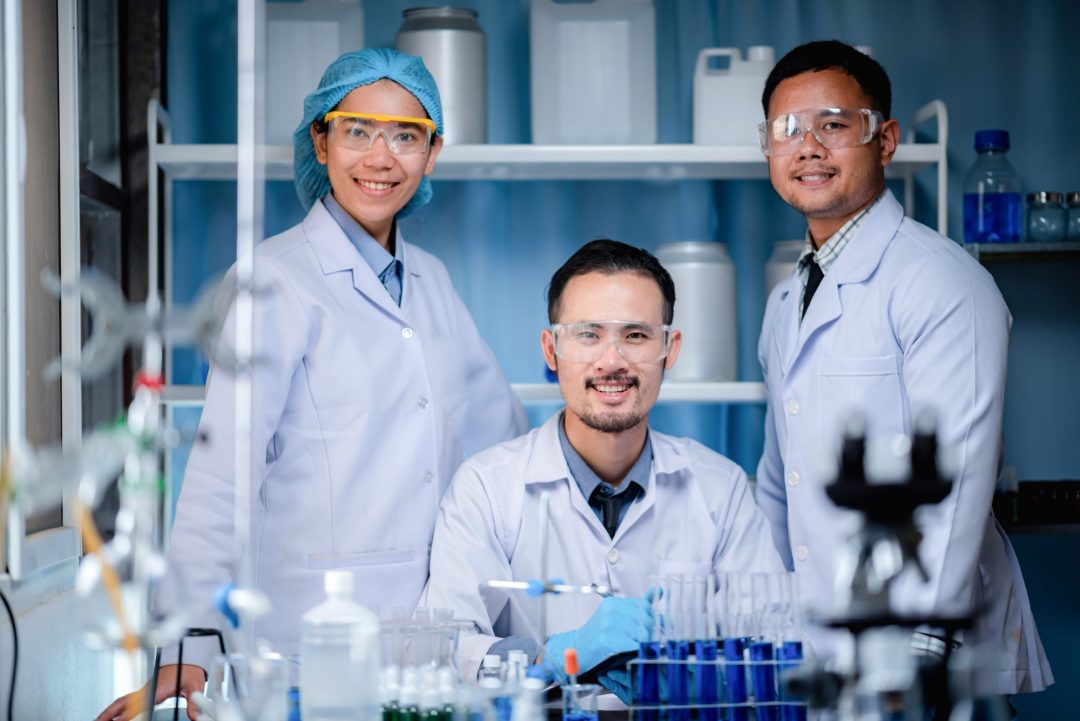Health care researchers working in medicals science technology research in laboratory